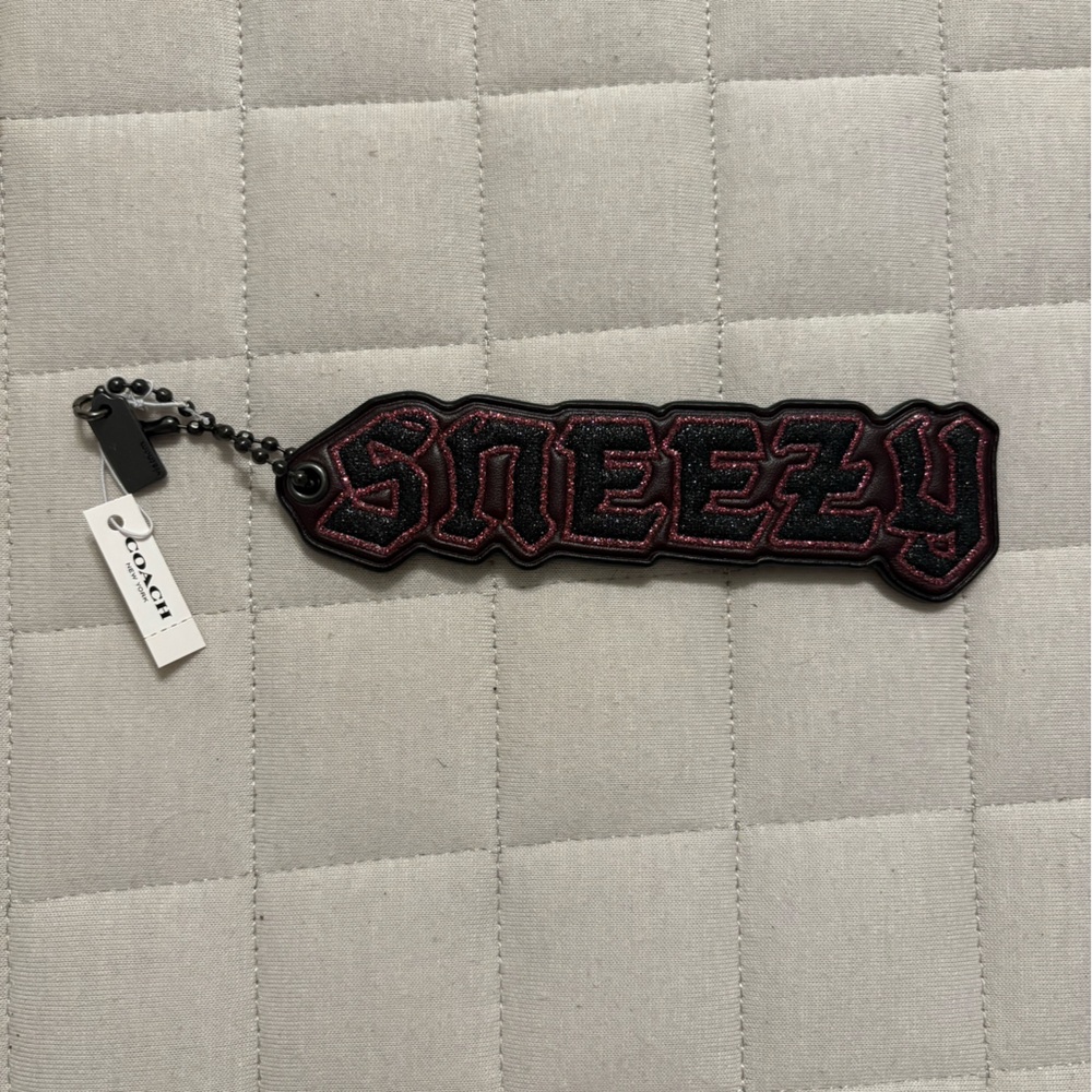 Coach x Disney - Snow Shite ‘Sneezy’ Keychain